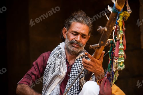 Preview: Street musician playing music instrument