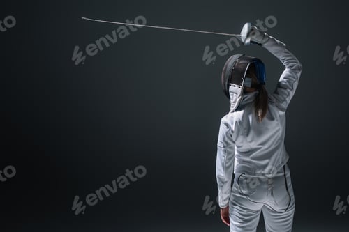 Preview: Back view of fencer holding rapier above head isolated on black
