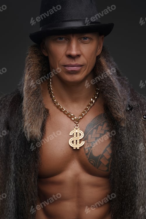 Preview: Portrait of muscular man with naked torso against dark background