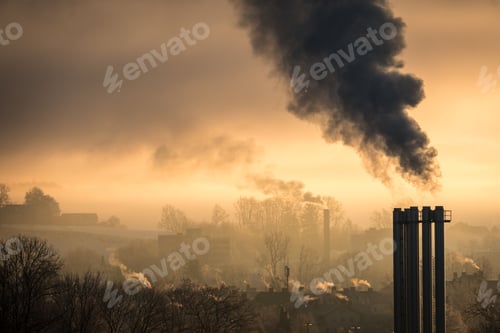 Preview: Factory emitting smoke and polluting the air on the sunset