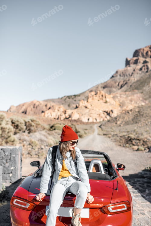 Preview: Woman traveling by car on the dessert valley