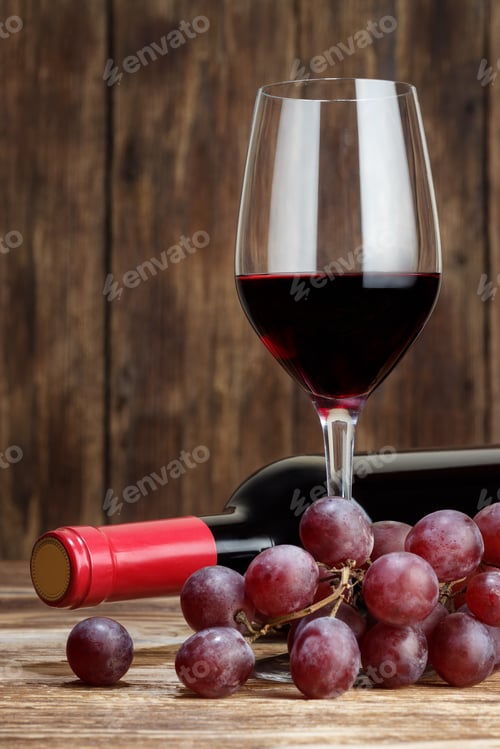 Preview: Bottle, grape and glass of red wine