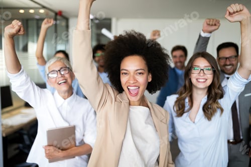 Preview: Group of successful business people in office