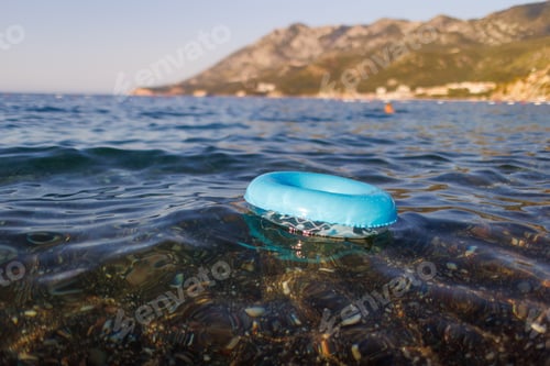 Preview: A blue rubber ring floats in the Adriatic Sea