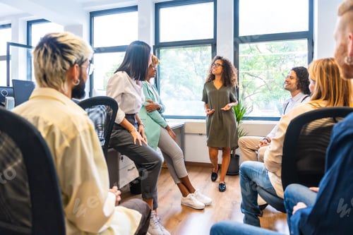 Preview: Members of a coworking in a meeting