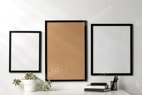 Preview: Three blank frames with copy space hanging on white wall