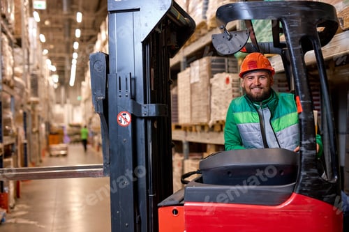 Preview: caucasian operator man working on Electric Forklift Truck in warehouse, dressed in uniform