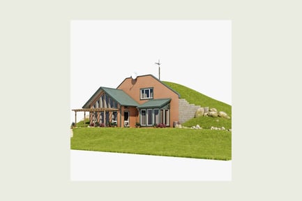 Preview: Brick house with porch and landscaped hillside