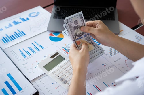 Preview: businesswoman counting money, finance, saving, banking, and people concept - close up of woman hands