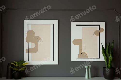Preview: Posters on grey wall above cabinet with plants in living room in