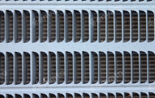 Preview: Exterior Air Conditioner Vents - Close Up Photograph Of Vents On An Exterior Air Conditioner Unit