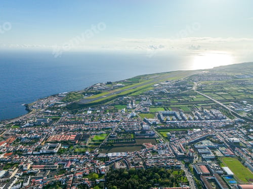 Preview: Coastal urban sprawl with visible airport