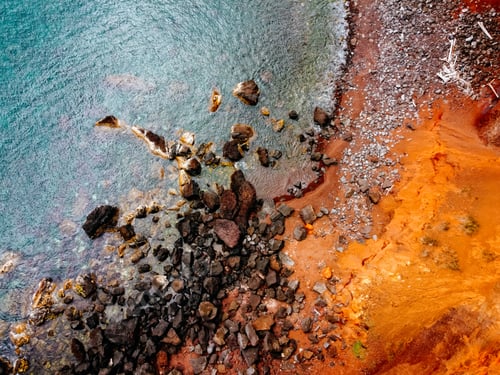 Preview: Drone view of orange Coast Rocks