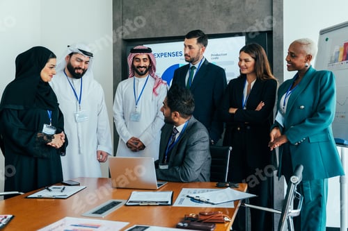 Preview: International business team meeting in dubai office collaborating