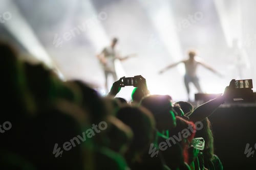 Preview: crowd partying stage lights live concert summer music festival