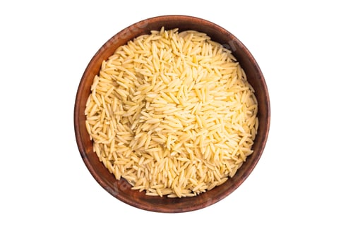 Preview: Raw Orzo pasta, uncooked dry Italian risoni in a bowl isolated on white background. top view