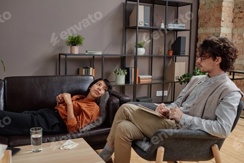 Preview: Modern Psychologist Working With Young Woman
