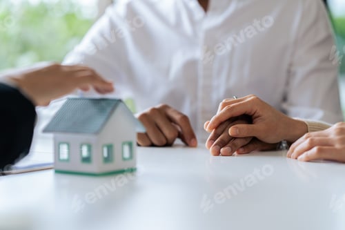 Preview: Young couple is listening to home purchase agreement with bank by taking out joint loan