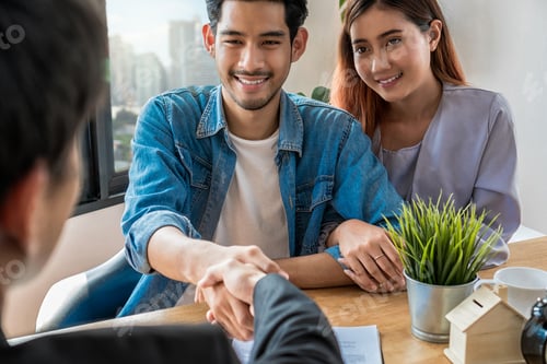 Preview: Back side of Hand shake between sale representative and house owner when sign contact