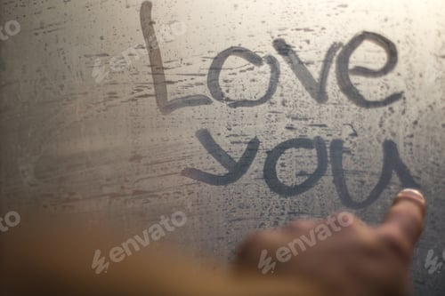 Preview: Love you sign on a window