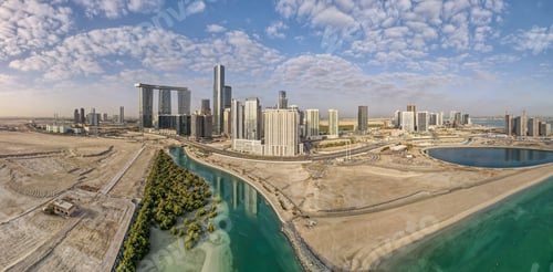 Preview: Aerial view on developing part of Al Reem island in Abu Dhabi on a cloudy day
