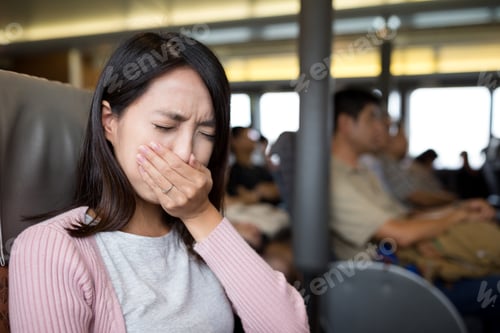 Preview: Young woman suffer from seasick on boat