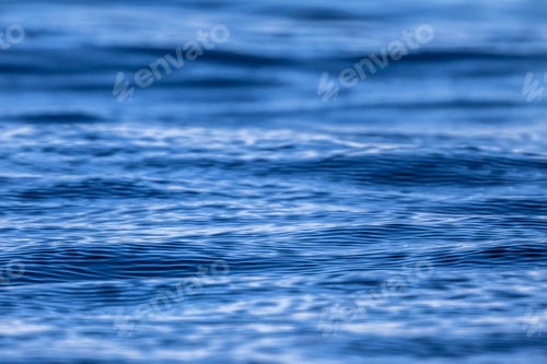 Preview: Abstract background of ripples in blue ocean water