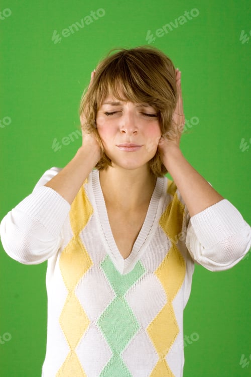 Preview: pretty woman covering her ears