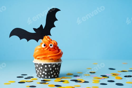 Preview: Monster orange funny cupcakes with eyes, halloween