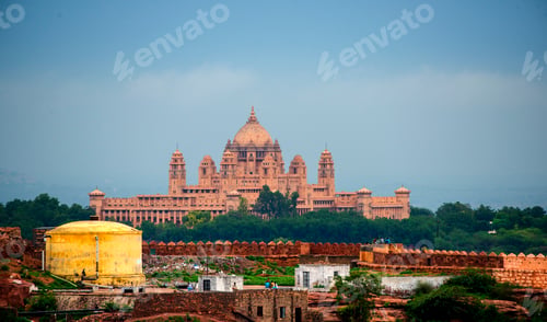 Preview: Woman tourist in front of Umaid Bhawan palace, Jodhpur, India