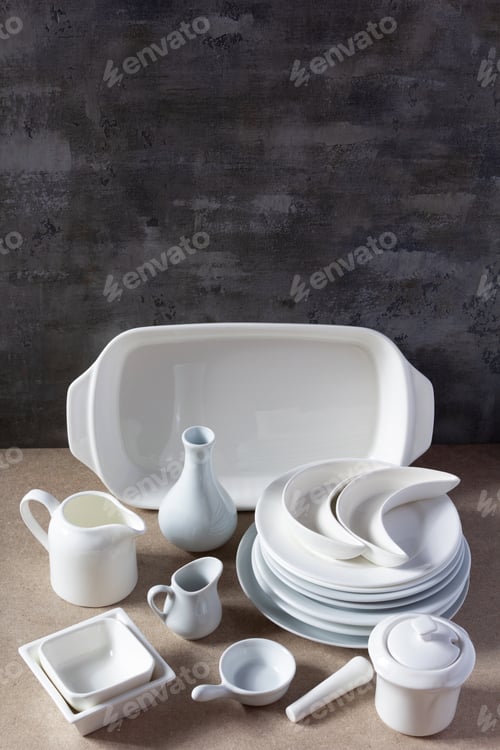 Preview: Empty crockery or ceramic dishes set. White kitchen dishware and tableware