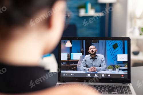 Preview: Student discussing with her teacher on online videocall