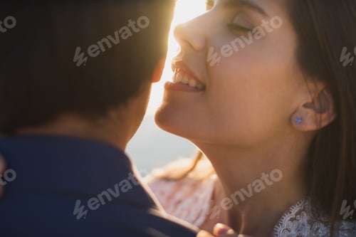 Preview: Bride and groom kisses tenderly. Sexy kissing stylish couple of lovers close up portrait