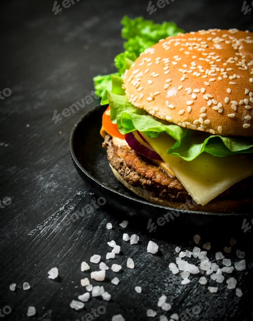 Preview: Hamburger with cheese, meat cutlet and vegetables.