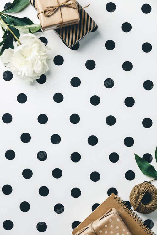 Preview: Gifts and a Flower on Polka Dot Background