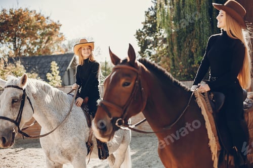 Preview: Elegant girls with a horse in a ranch