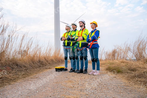 Preview: Wind turbine maintenance engineer at wind farm construction site.