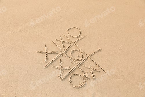 Preview: Tic tac toe game drawn on sandy beach, above view