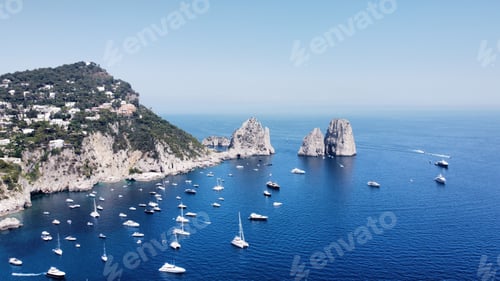 Preview: Aerial view of Faraglioni rock formations.