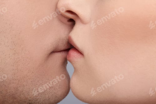 Preview: Close Up Portrait Of Young Caucasian Couple Kissing