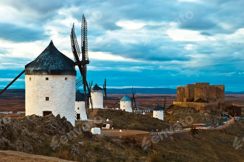 Historic Spanish Windmills with Medieval Castle Backdrop