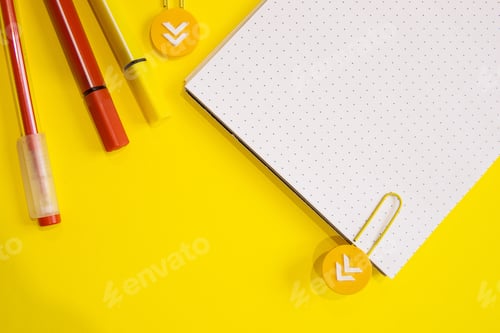 Preview: Yellow and red colors. Flat lay composition. Yellow background. Space for text. Back to school.