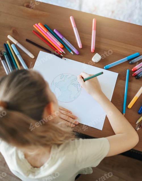 Preview: Child girl drawing with colorful pencils