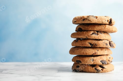 Preview: Stack of Chocolate Chip Cookies on Marble Table