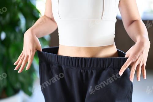Preview: Asian woman checking diet results