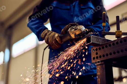 Preview: Industrial Worker Crafting Metal With Angle Grinder and Flying Sparks