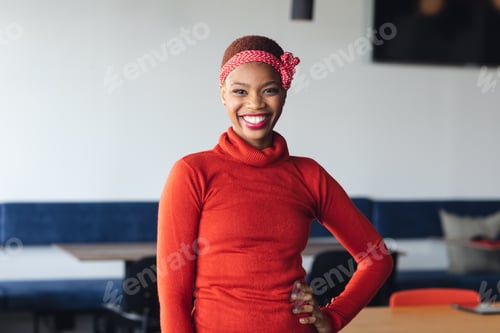 Preview: Portrait of smiling african american businesswoman in office, copy space