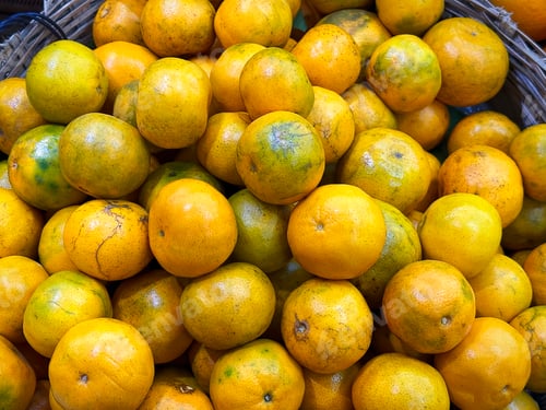 Preview: Pile of Tangerines in a Basket