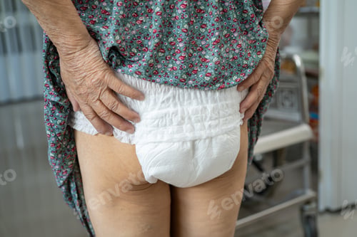 Preview: Asian senior woman patient wearing incontinence diaper in hospital.