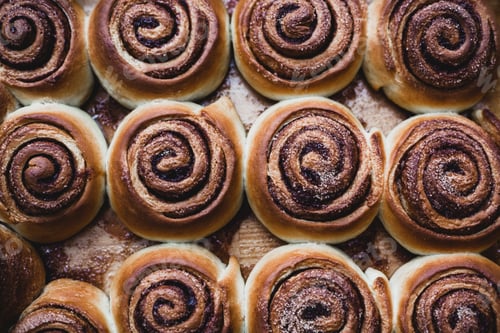 Preview: Cinnamon rolls on a tray after baking